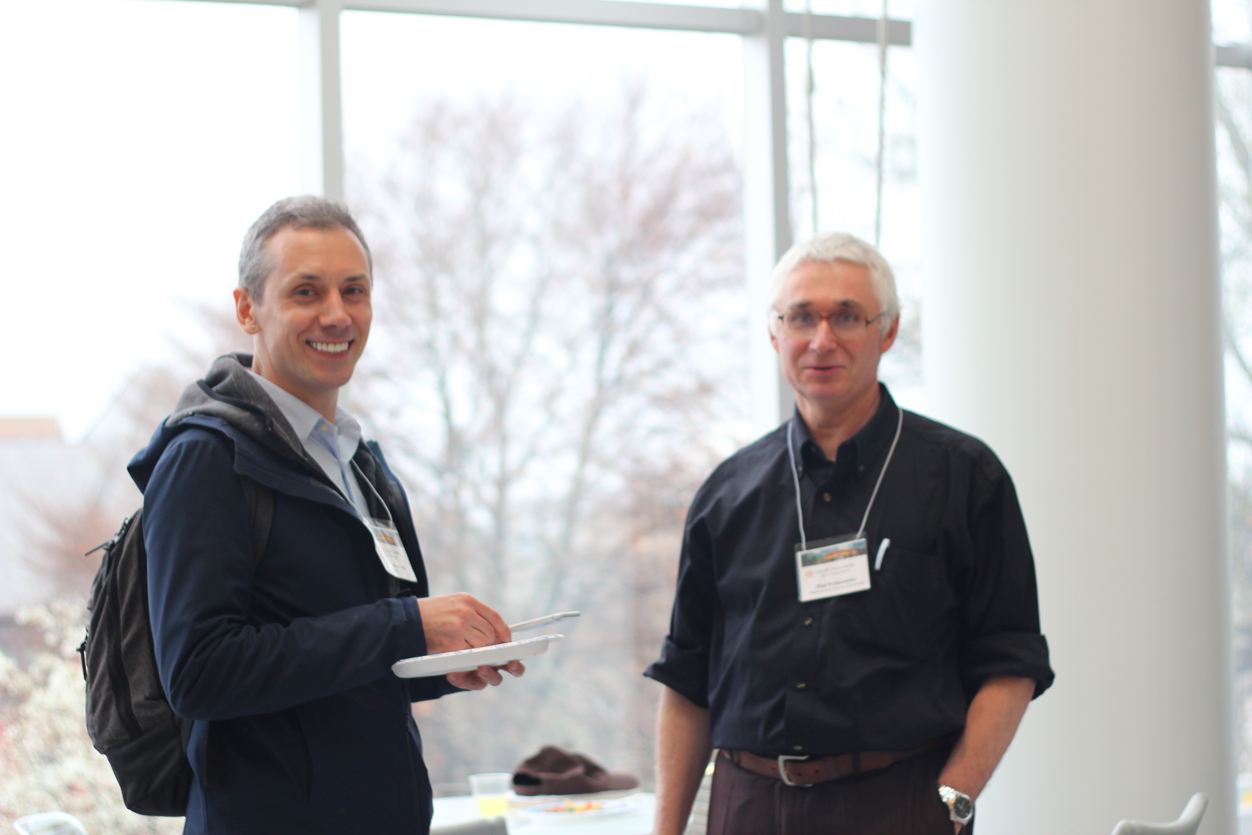 Alex Kudryavtsev (Natural Resources) and Vlad Protasenko (Electrical and Computer Engineering) connect at the workshop reception.