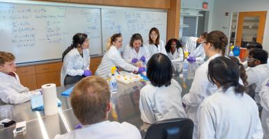 Students gather for a demonstration in a class in 391 Tang Hall